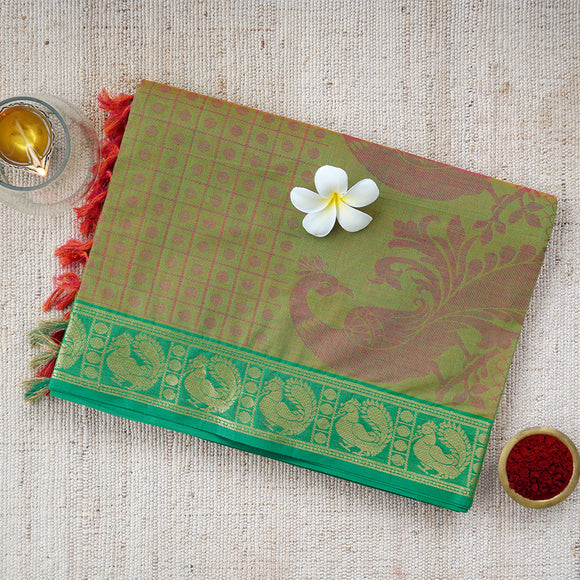 Handwoven light green saree with rudraksha motifs spread across the body