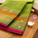 Devi Energised Cotton Saree – Olive Green with Mustard Gold & Magenta Pink Woven Border