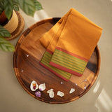 Devi Energised Cotton Saree – Golden Orange with Olive Green & Rust Red Woven Border