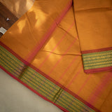 Devi Energised Cotton Saree – Golden Orange with Olive Green & Rust Red Woven Border