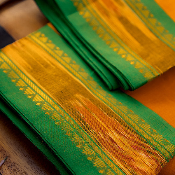 Devi Consecrated Cotton Saree – Saffron Orange with Emerald Green & Golden Woven Border