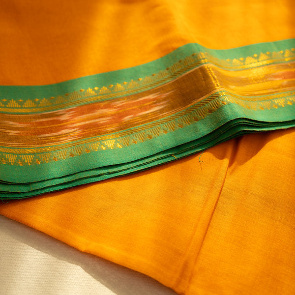 Devi Consecrated Cotton Saree – Saffron Orange with Emerald Green & Golden Woven Border
