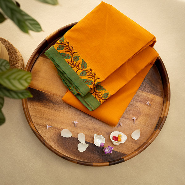 Devi Energised Cotton Saree – Saffron Orange with Green Border