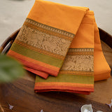 Devi Energised Cotton Saree – Golden Orange with Olive Green & Rust Red Traditional Floral Border