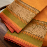 Devi Energised Cotton Saree – Golden Orange with Olive Green & Rust Red Traditional Floral Border