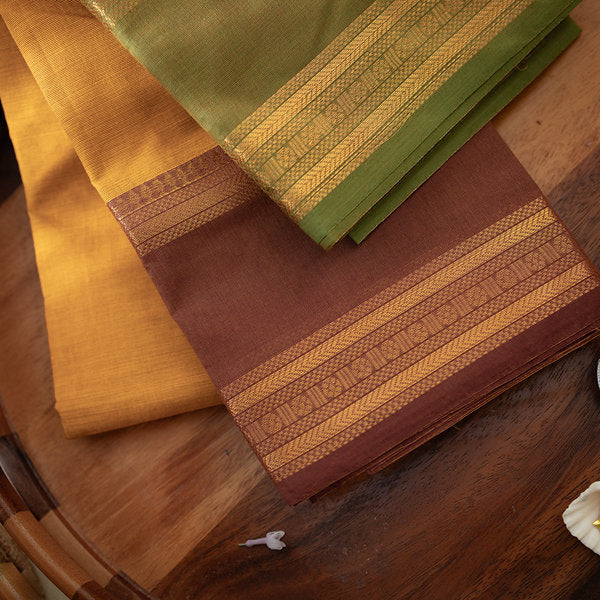 Devi Energised Cotton Saree – Golden Mustard Yellow with Olive Green & Chocolate Brown Traditional Border