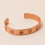 Chakra copper cuff. Crafted with the mantras of the seven chakras.