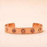 Chakra copper cuff. Crafted with the mantras of the seven chakras.