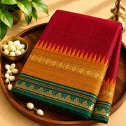 Devi Energised Cotton Saree – Deep Red with Emerald Green and Mustard Gold Border