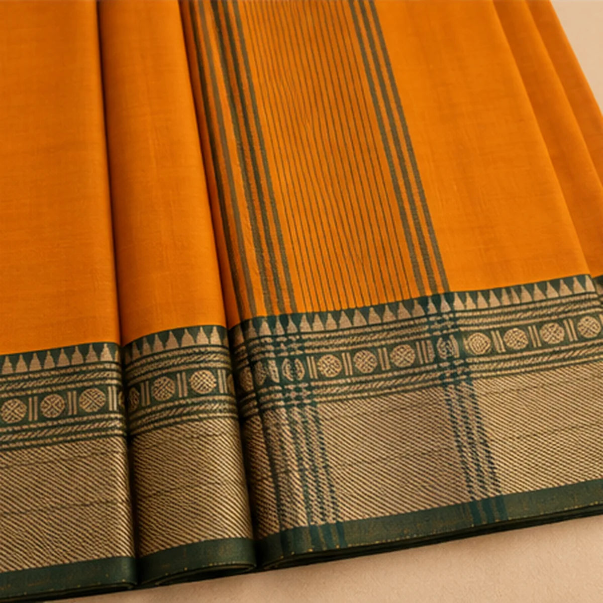 Devi Energised Cotton Saree – Mustard Orange with Green & Gold Border